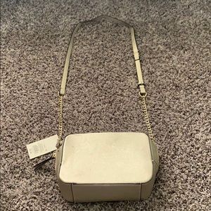 New gold square crossbody purse.